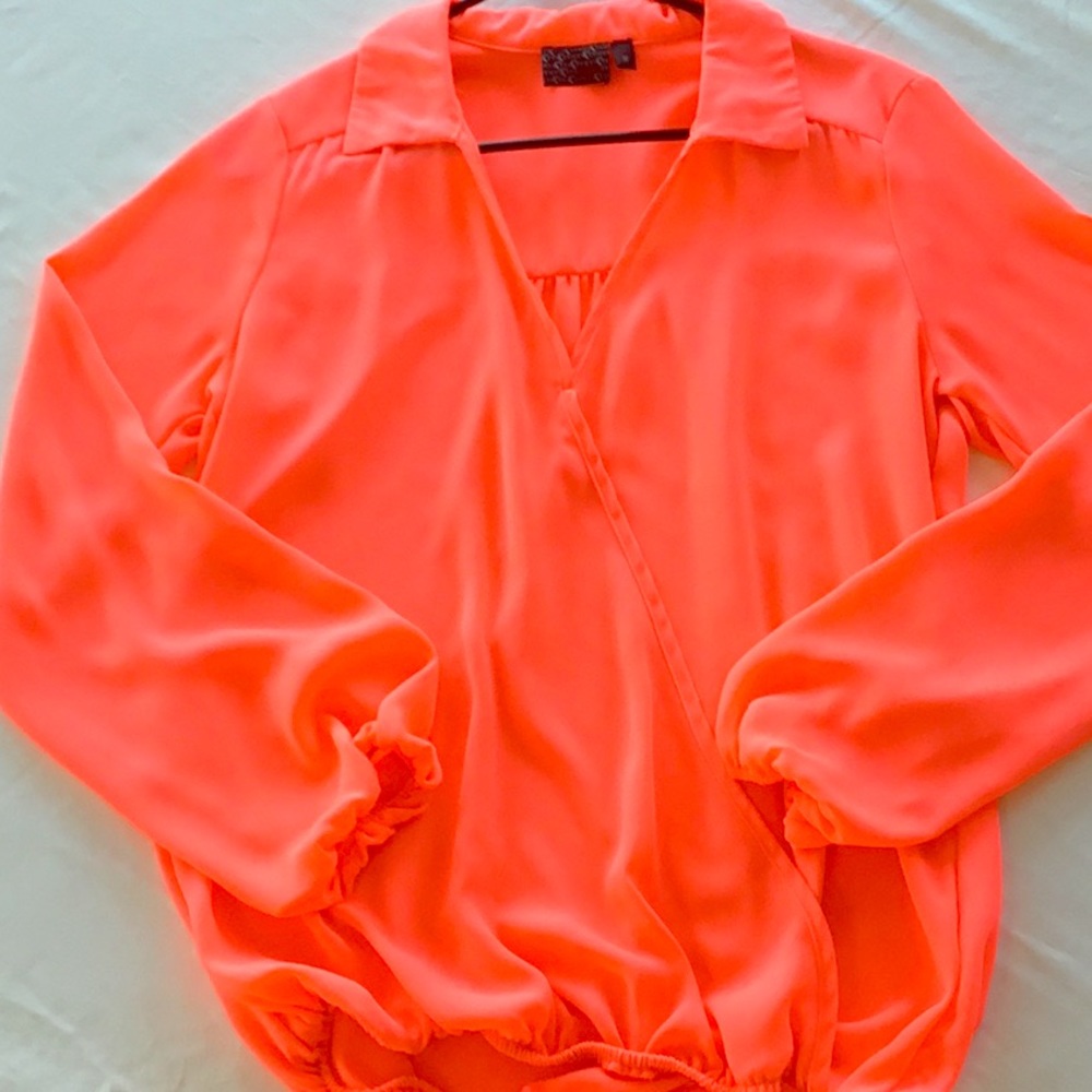 Neon orange stylish dressy blouse.